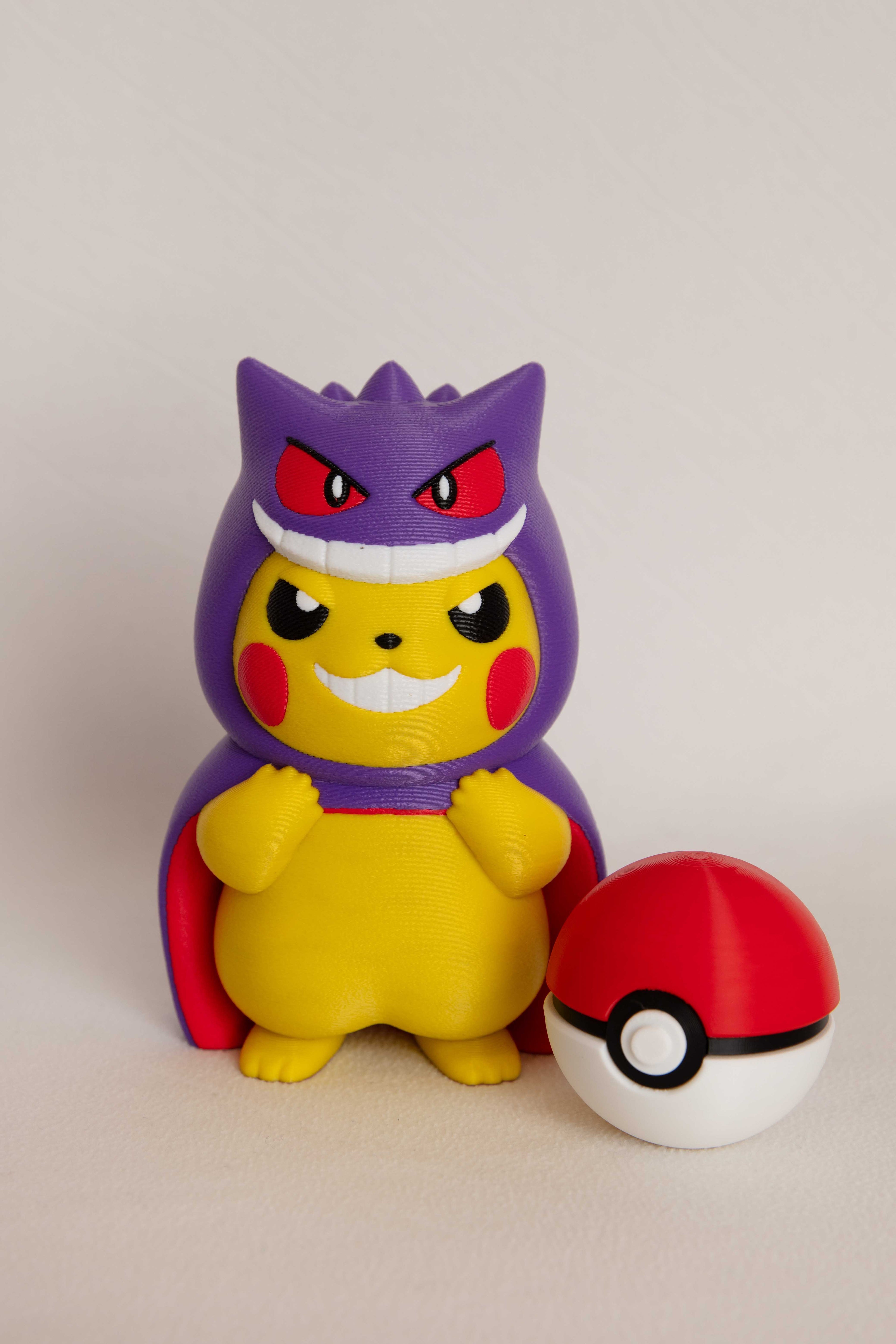 Pikachu Wearing Gengar Costume