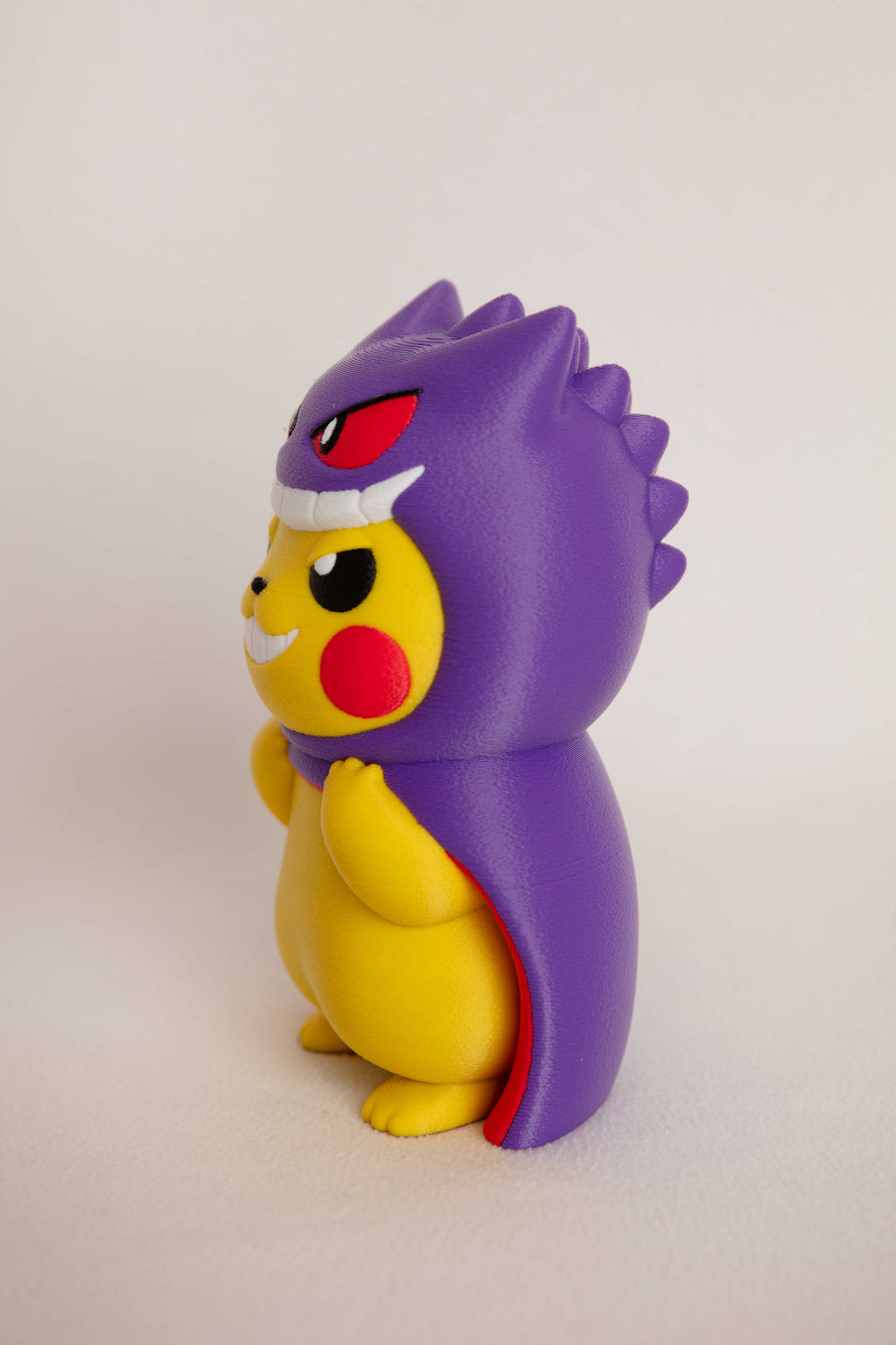 Pikachu Wearing Gengar Costume