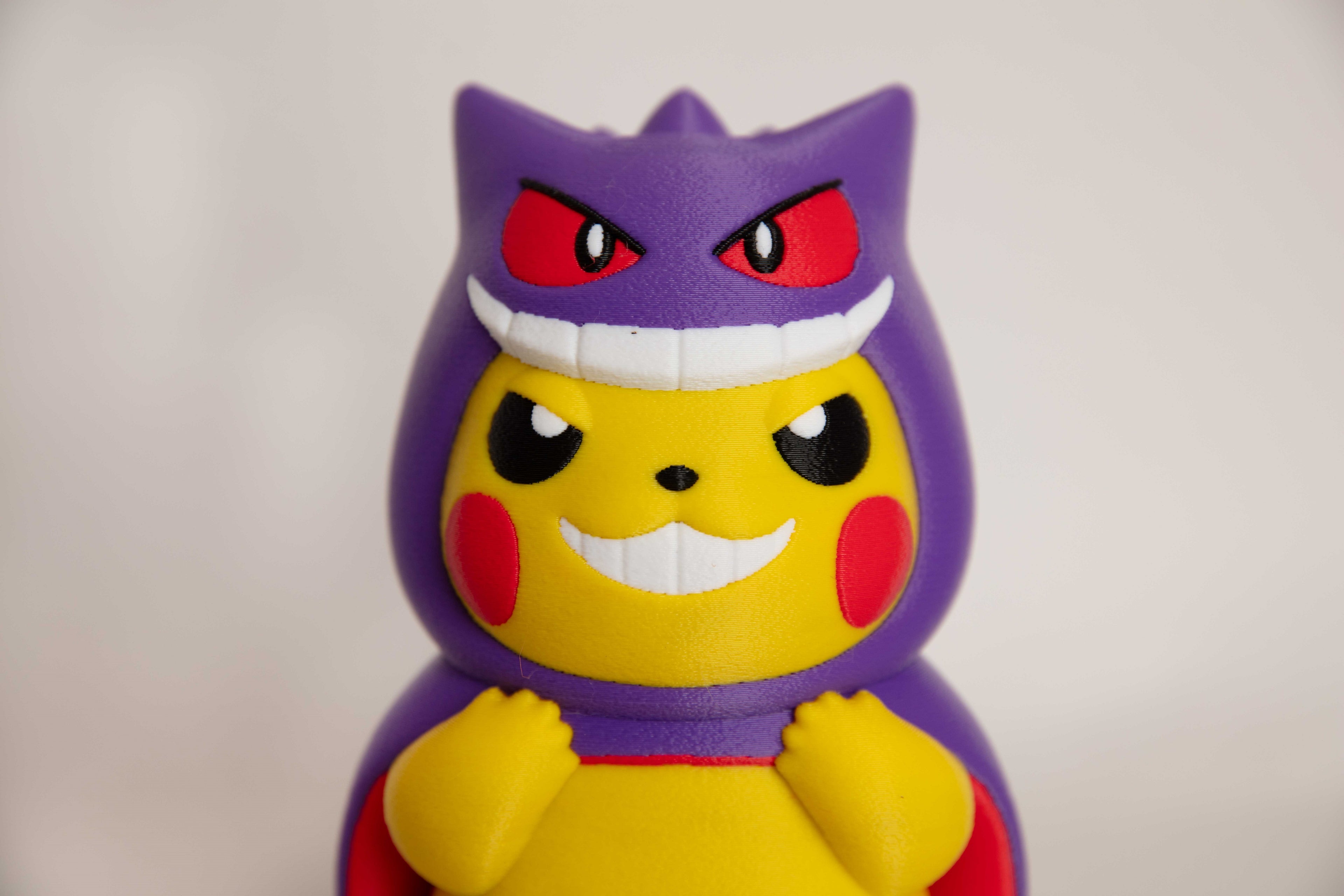 Pikachu Wearing Gengar Costume