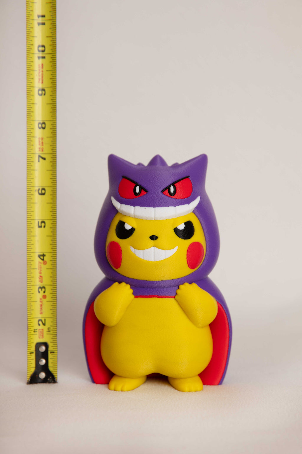 Pikachu Wearing Gengar Costume