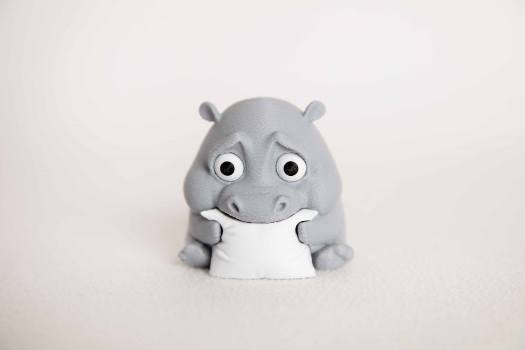 Cute Hippo Figurine Holding Pillow – 3D Printed Desk Decor