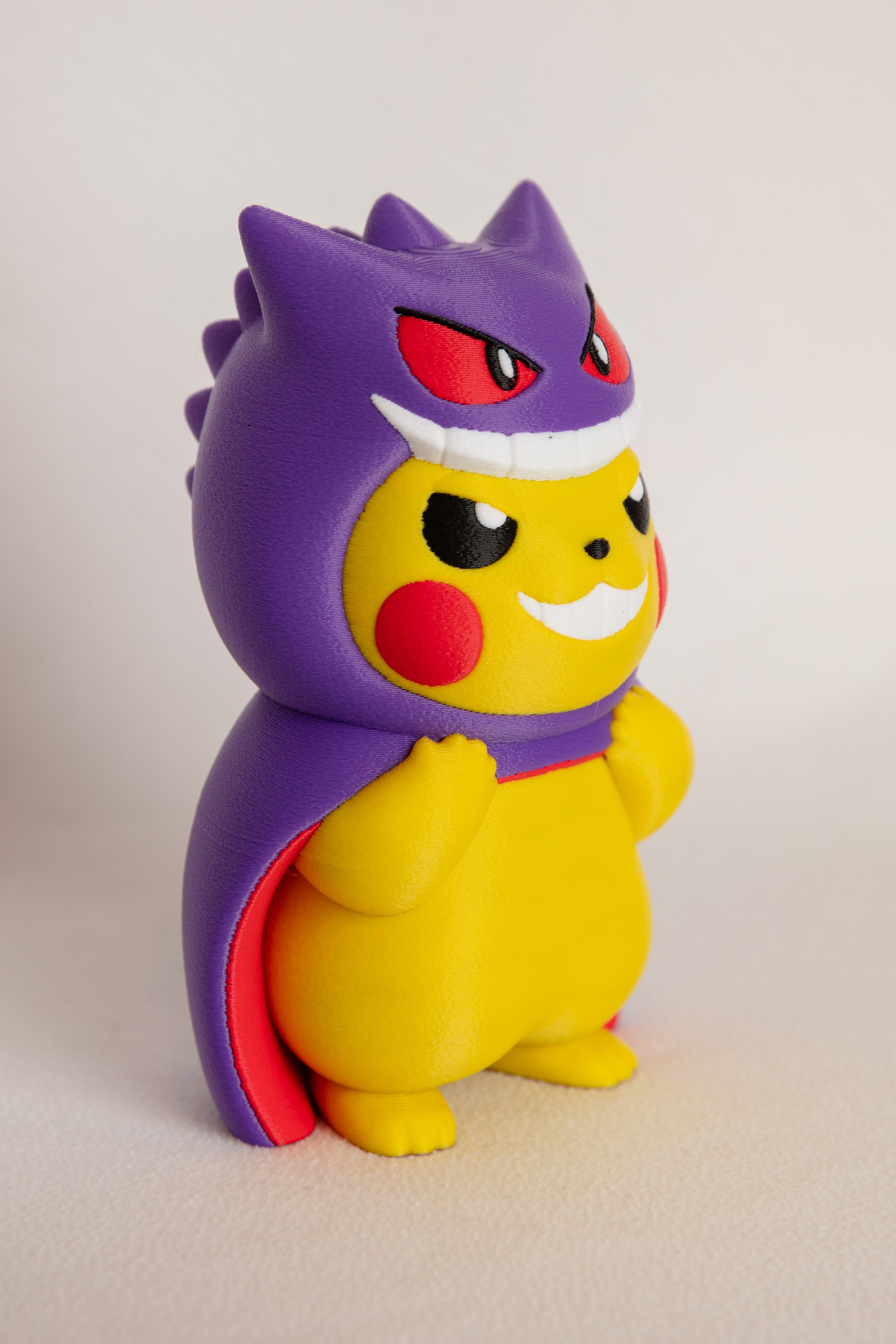 Pikachu Wearing Gengar Costume